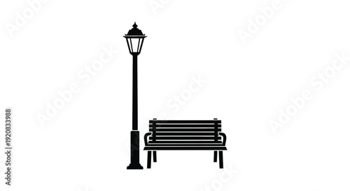 A park bench and lamppost in a simple black silhouette