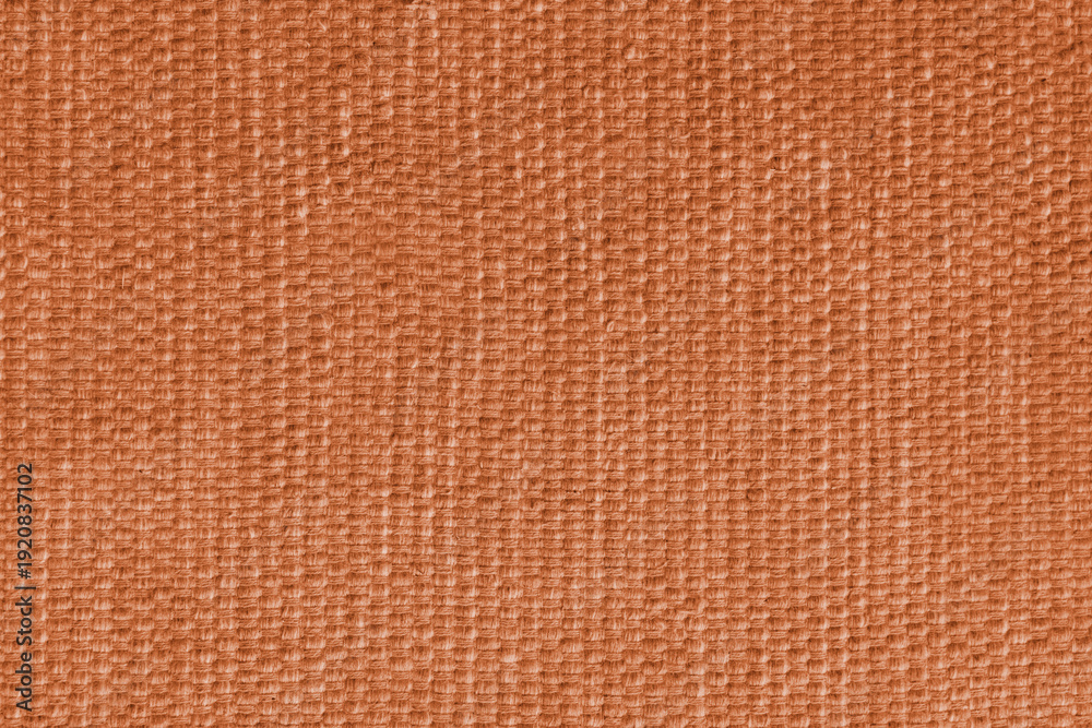 Fototapeta premium Orange upholstery fabric, textile texture with detailed woven textile pattern, close up, macro. Cloth background for interior design, furniture, wallpapers, decor, packaging and creative backdrops.