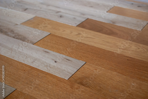 Fényképezés parquet flooring repair with unfinished wooden planks