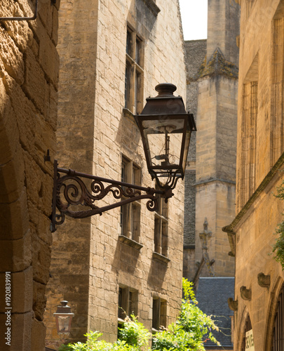 France, Midi-Pyrénées, Sarlat-la-Caneda.  Decorative exterior lighting in this market town.