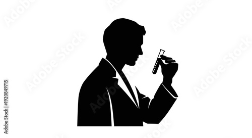Silhouette of a scientist or doctor holding a test tube for research and development in a laboratory setting