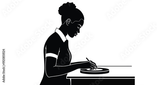 A scientist examines a sample on a petri dish with a stylus.