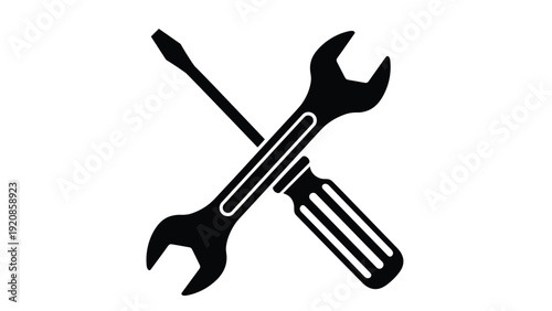 Crossed screwdriver and wrench icon in black and white silhouette, symbolizing repair, maintenance, and DIY technical service.