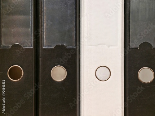 Contemporary binder with bold accents. Minimalist office storage solution with sharp contrasts