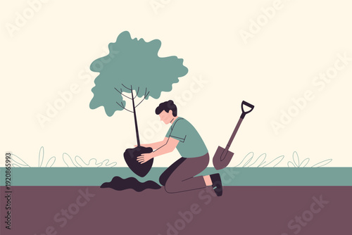 Man planting tree in garden with shovel