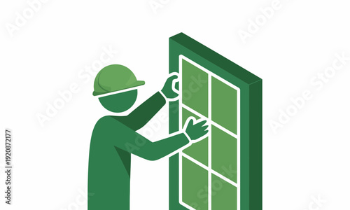 Worker installing green solar panel.
