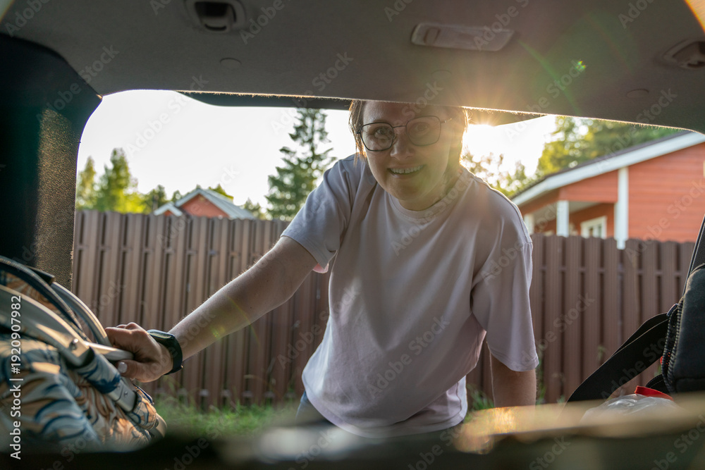 custom made wallpaper toronto digitalWoman Loading Bag into Car Trunk