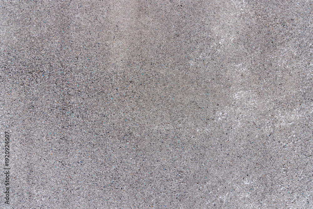Obraz premium 細かい砂利が密集した壁のテクスチャ（洗い出し仕上げ）