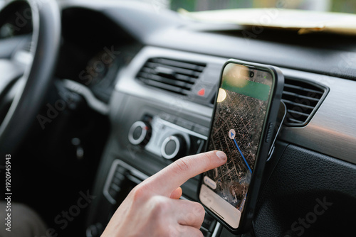 A man uses a navigator on a mobile phone