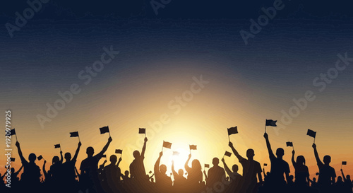 Crowd celebrating with flags at vibrant sunset