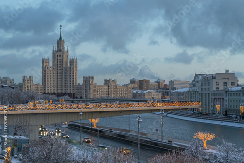 Moskvoretskaya embankment of the Moskva River and the Stalin high-rise apartment building on Kotelnicheskaya Embankment with New Year decorations, Moscow, Russia