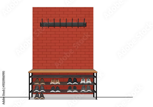 Shoe storage bench with various footwear in front of a red brick wall