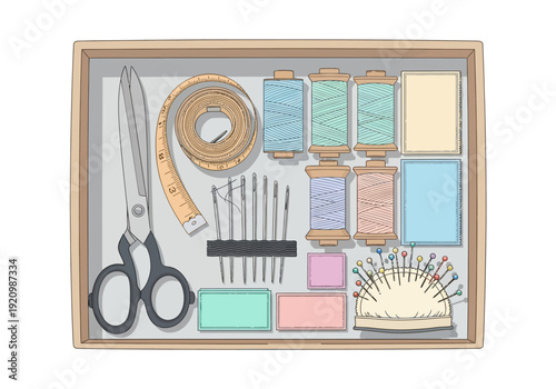 Sewing kit with scissors and threads organized in a wooden box