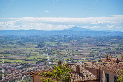 Bild auf Leinwand Cortona, Tuscany, Italy: Italian countryside with distant mountains and town