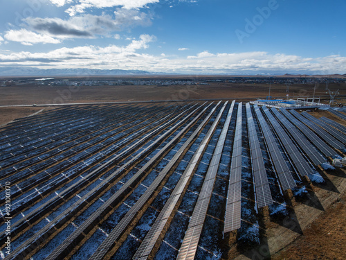 Wall Mural Aerial View of Photovoltaic Power Station with Grazing Yaks on Snowy Zoige Plate