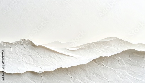 Abstract landscape art created from crumpled white paper resembling gentle rolling hills and soft, ethereal mist, invoking a sense of serenity and minimalist beauty