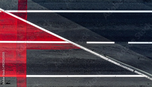 Aerial view of asphalt road lanes with red overlay