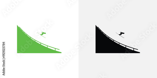 Skier jumping on ramp in green and black