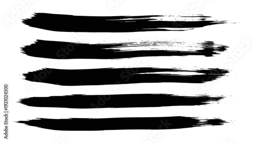 Set of Five Black Brush Stroke Textures on White Background.