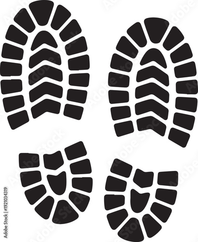 A black and white silhouette of some boot prints