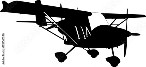 Small propeller aircraft silhouette flying in the sky for private aviation