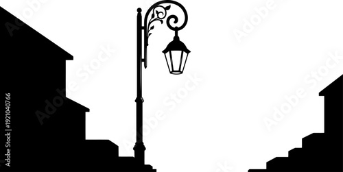 Vintage ornamental street lamp silhouette in urban alleyway