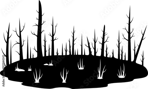 Barren dead tree forest silhouette in a swampy landscape
