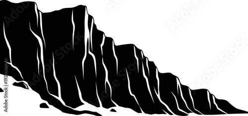 Steep vertical cliff face silhouette showing dramatic rocky mountain terrain