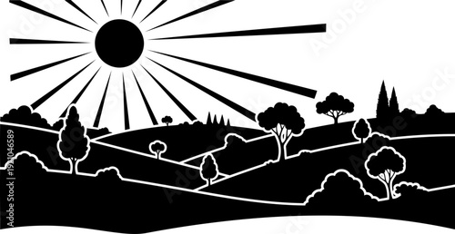 Sunburst rays shining over a hilly landscape silhouette