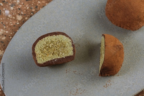 Принти на полотні flat lay of Dubai style chewy cookie with chocolate shell, marshmallow base, pistachio filling and delicate kataifi strands, captured in close up detail