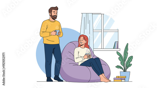 Happy young couple enjoying a relaxed morning together while drinking hot coffee in a cozy and peaceful home environment.