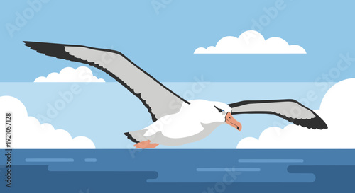 Majestic Albatross Soaring Over Calm Ocean Waves Under Cloudy Blue Sky