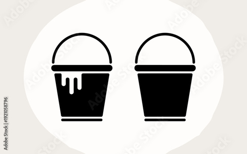 Two black silhouette icon buckets side-by-side on a white gradient background. One bucket overflows with dripping paint, suggesting creativity, art, and a mess; the other holds its contents securely,