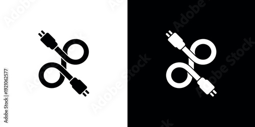 Black and white electrical cables on split background