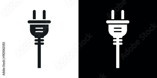 Black and white electrical plug on split background