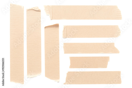 Set of brown adhesive tape strips isolated on white background.Collection of torn masking tape pieces for design and scrapbooking.