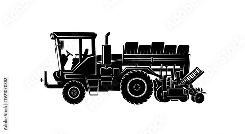 Tractor with seed planter attachment in profile view black silhouette on white background for agriculture and farming concepts