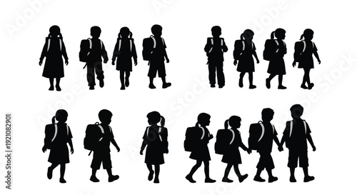 Silhouettes of children walking and standing in a group possibly at school