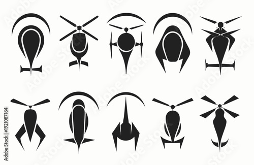 Black silhouettes of various helicopter designs on white background