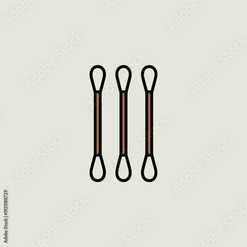 Three identical black rubber bands on a pale green background.