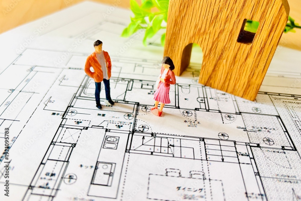 Obraz premium マイホームの間取りを考える夫婦