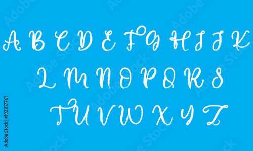 Hand Drawn Brush Alphabet Letters Set. Complete uppercase alphabet in bold hand drawn brush style, white ink lettering isolated on sky background for typography and design projects.