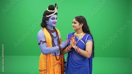 Lord Rama and Sita in traditional Indian attire on a green screen.