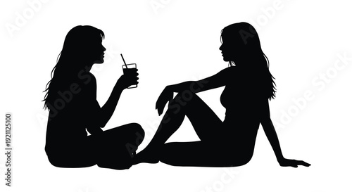Two young women are seated facing each other one holding a drink with a straw a striking silhouette