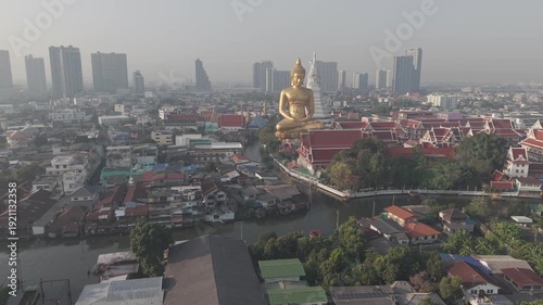 Big golden buddha statue riverside temple pagoda local village city background Bangkok Thailand