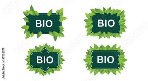 Collection of four dark green bio labels and frames decorated with fresh green leaves for organic product packaging.