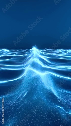 A stunning video showcasing a vibrant blue underwater scene with sparkling particles and a glowing wave