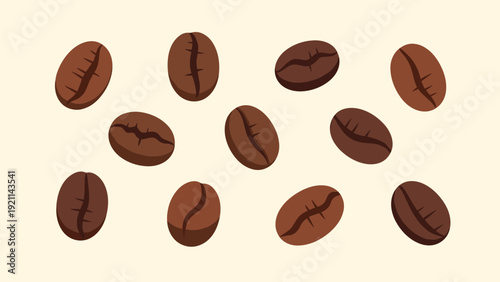 Eleven dark roasted coffee beans scattered on a light beige background for use in food photography cafe advertising or menu backgrounds.