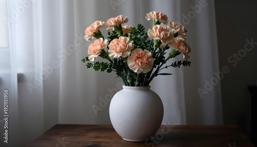 Wallpaper Mural Soft peach carnations arranged in a textured white vase on a wooden table Torontodigital.ca