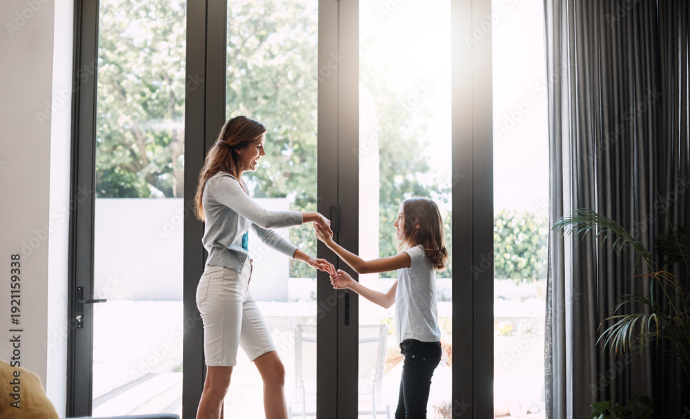 Obraz premium Happy, mother and child with dancing in home for bonding together, healthy relationship and support. Love, mom and kid with learning rhythm in apartment for weekend fun, connection and holding hands